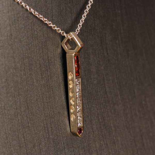 Diamond and gemstone 14k cigarette pendant with chain