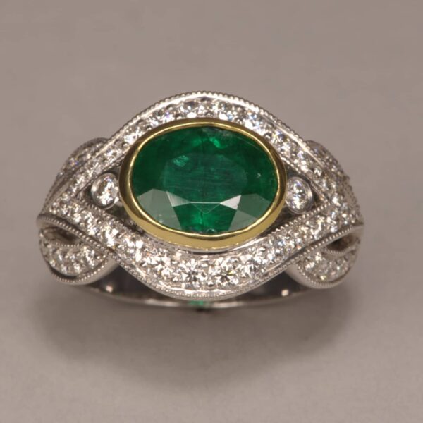 Emerald and diamond ring, stunning two tone gold design