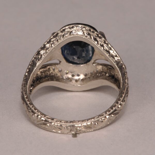 Midnight blue sapphire and diamond ring, fine deep color