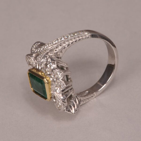 Emerald and diamond ring, two tone gold, roaring 20's design