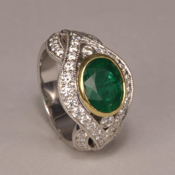 Emerald and diamond ring, stunning two tone gold design