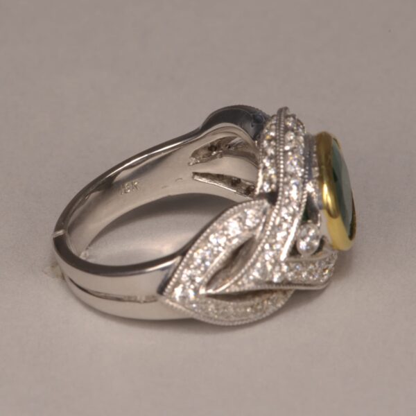 Emerald and diamond ring, stunning two tone gold design