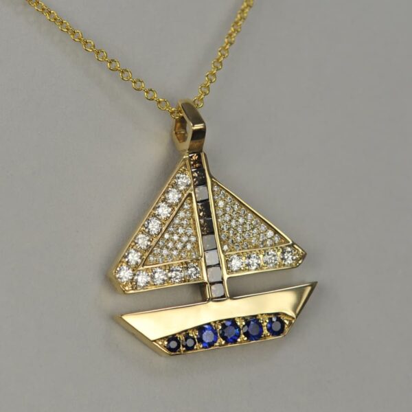 14K yellow gold geometric sailboat diamond pendant with chain