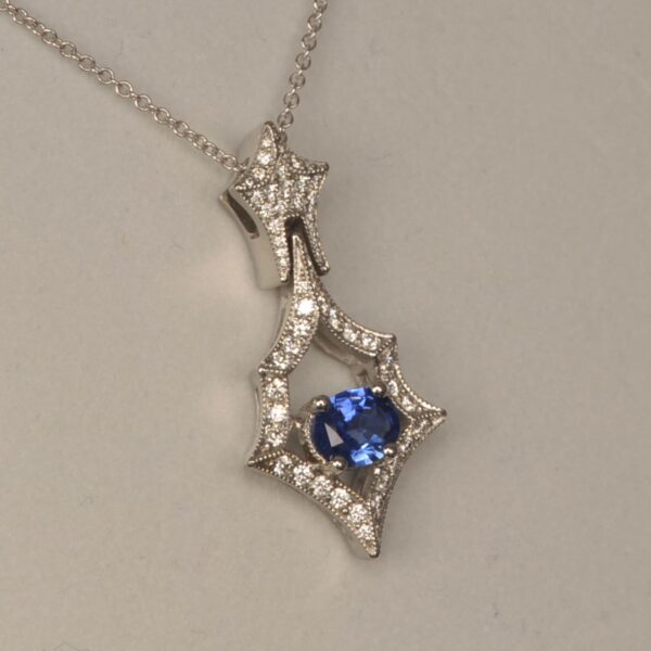 Fine blue sapphire and diamond pendant, handmade in the USA, Brand new