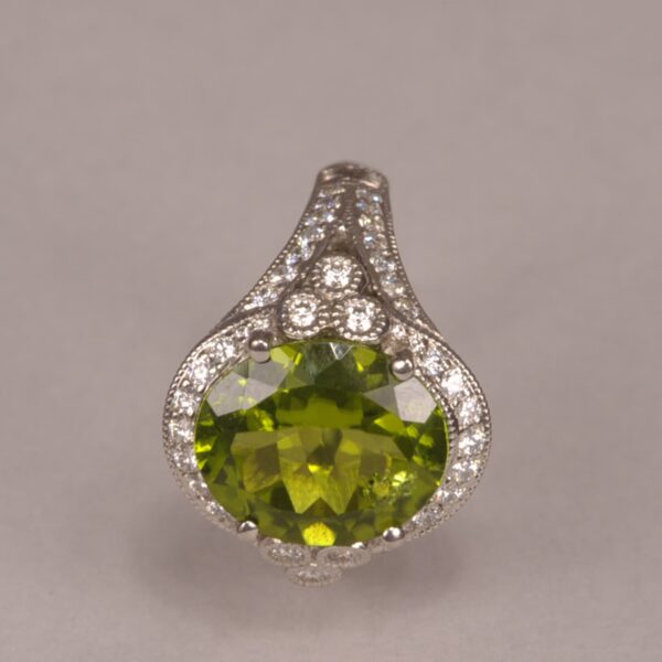 Impressive natural peridot and diamond ring