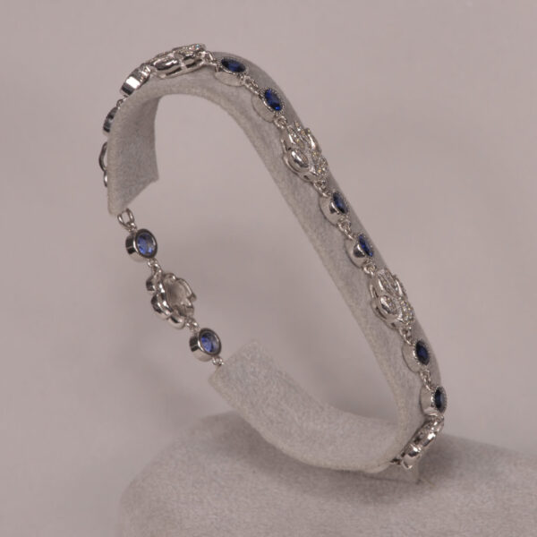 14K white gold diamond and sapphire cat paw bracelet