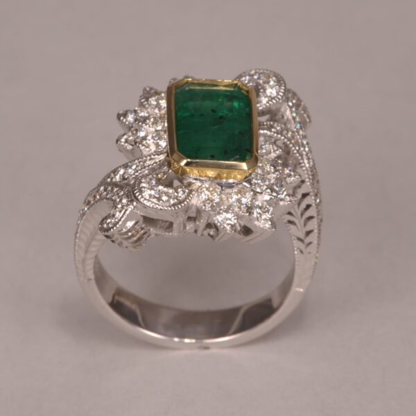 Emerald and diamond ring, two tone gold, roaring 20's design