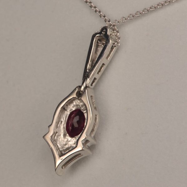 Rubelite (red) tourmaline and diamond pendant, Cajuel deco style