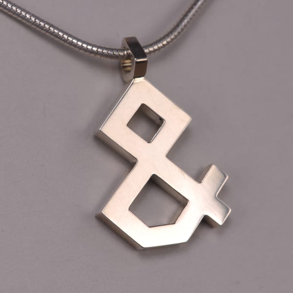 Sterling Silver ''And'' symbol Pendant, Cajuel & geometric design