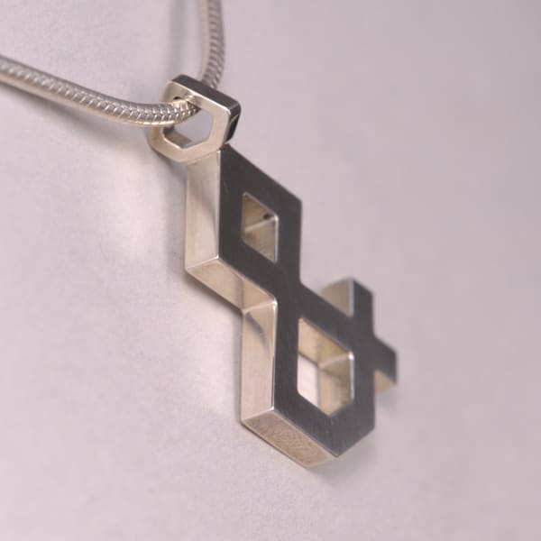 Sterling Silver ''And'' symbol Pendant, Cajuel & geometric design