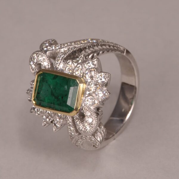 Emerald and diamond ring, two tone gold, roaring 20's design