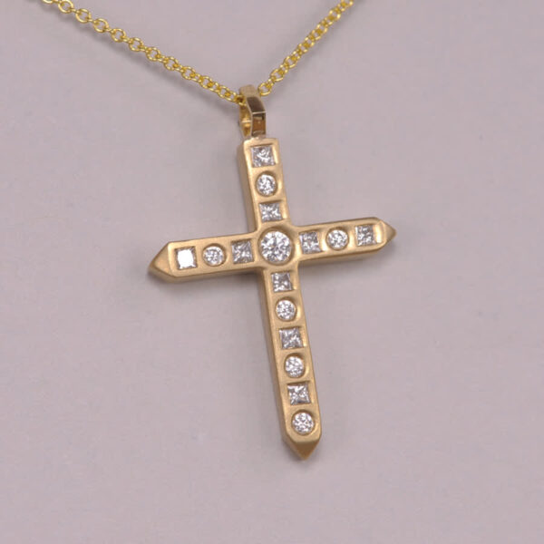 cool diamond cross, unique sandblast finish with gold chain