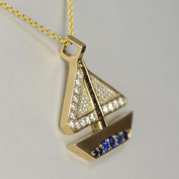 14K yellow gold geometric sailboat diamond pendant with chain