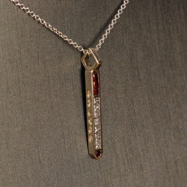 Diamond and gemstone 14k cigarette pendant with chain