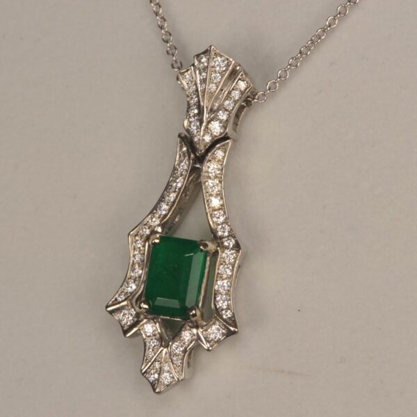 Fine green and diamond pendant inc chain.  Top color, great piece