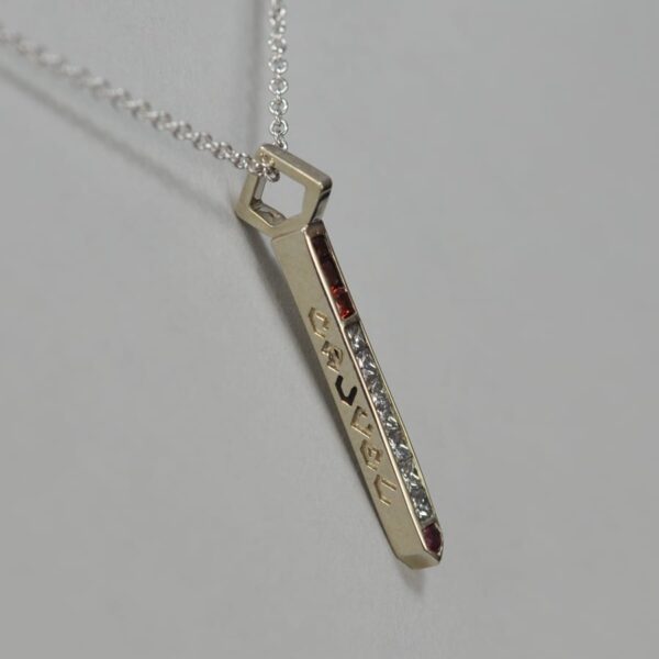 14k diamond and ruby and orange sapphire cigarette pendant with chain