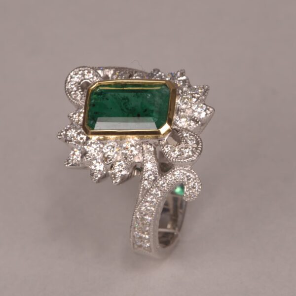 Emerald and diamond ring, two tone gold, roaring 20's design