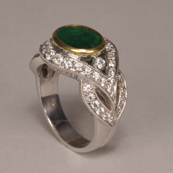 Emerald and diamond ring, stunning two tone gold design