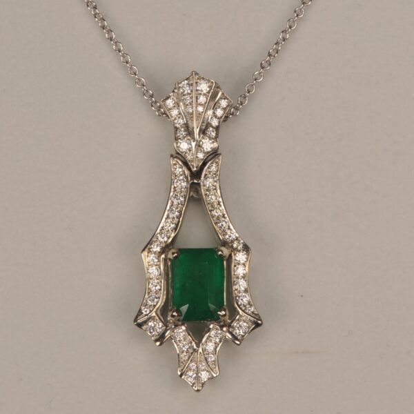 Fine green and diamond pendant inc chain.  Top color, great piece