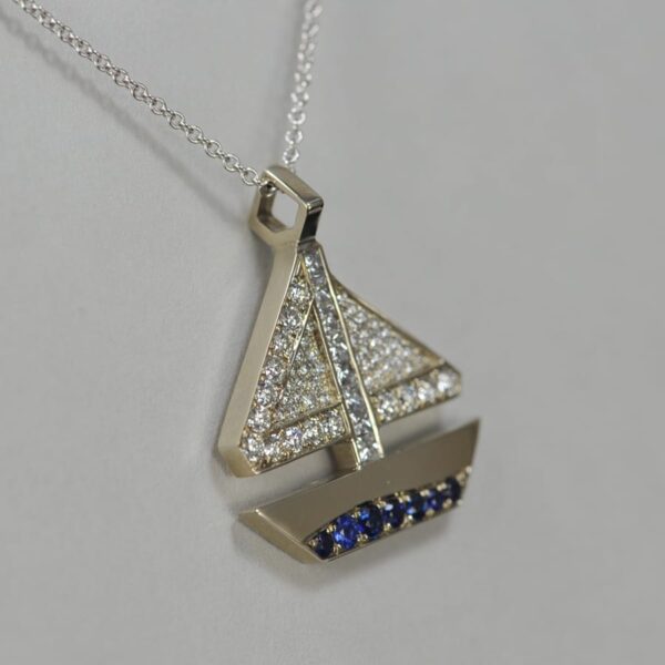 14k solid gold diamond and sapphire geometric sailboat pendant with chain