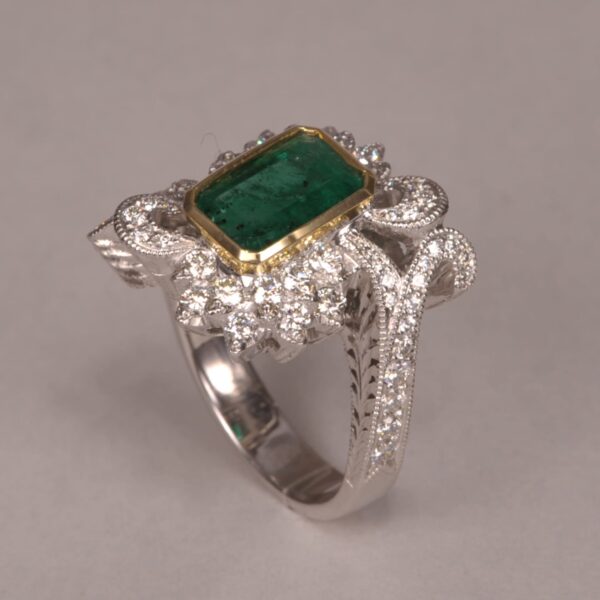 Emerald and diamond ring, two tone gold, roaring 20's design