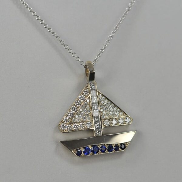 14k solid gold diamond and sapphire geometric sailboat pendant with chain