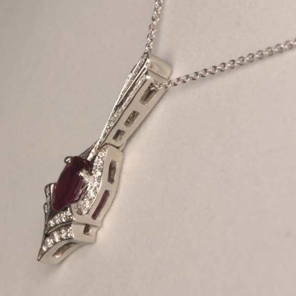 Rubelite (red) tourmaline and diamond pendant, Cajuel deco style