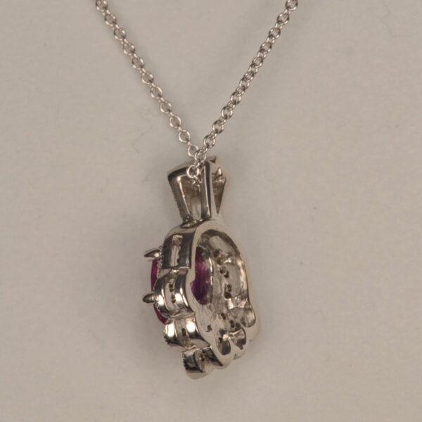 Hot pink sapphire and diamond pendant with chain, vibrant and brilliant