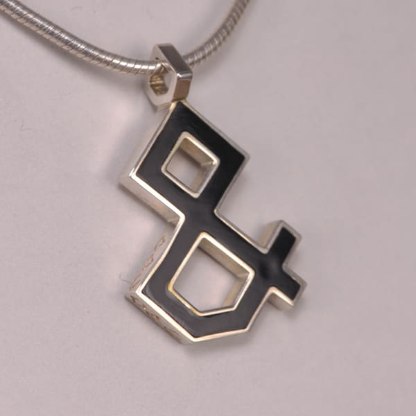 Enameled Sterling Silver ''And'' Symbol Pendant, Cajuel geometric design