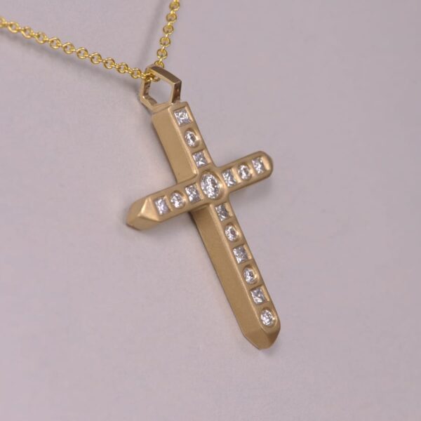 cool diamond cross, unique sandblast finish with gold chain