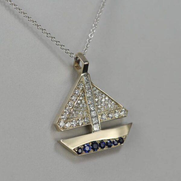 14k solid gold diamond and sapphire geometric sailboat pendant with chain