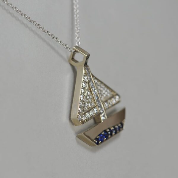 14k solid gold diamond and sapphire geometric sailboat pendant with chain