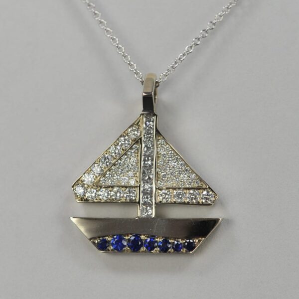 14k solid gold diamond and sapphire geometric sailboat pendant with chain