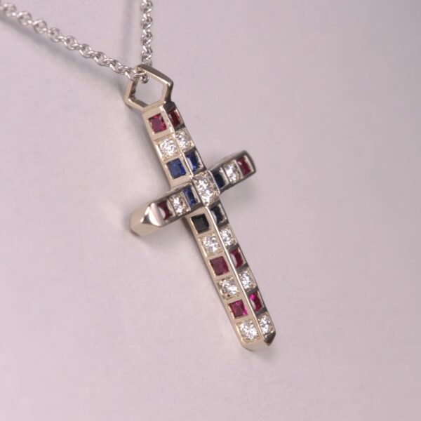 14K USA red, white and blue crucifix, diamond, sapphire and ruby