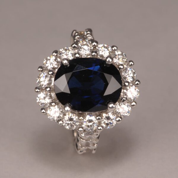 Royal Blue Sapphire and diamond ring, large and fine side diamonds