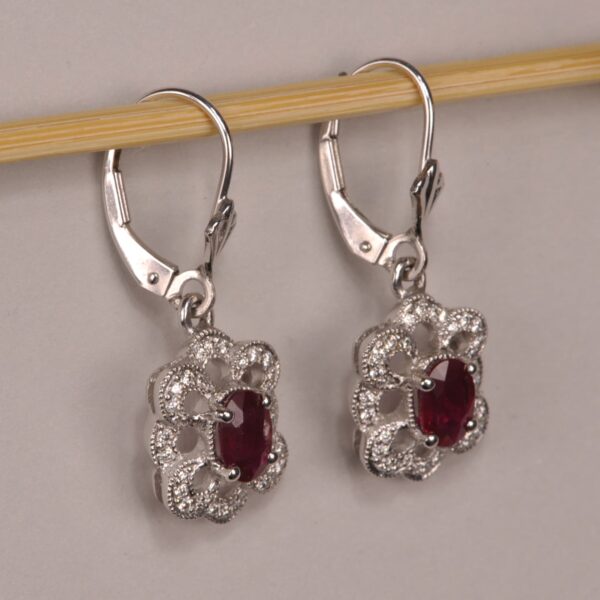 Ruby and diamond dangle earrings, dangle with movement