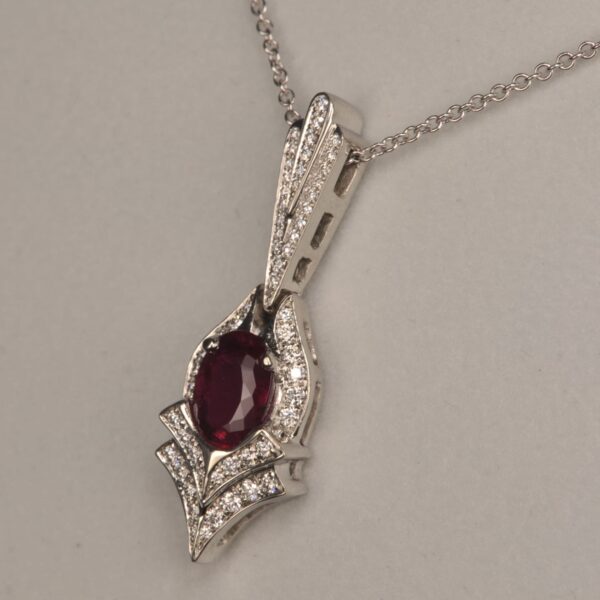 Rubelite (red) tourmaline and diamond pendant, Cajuel deco style