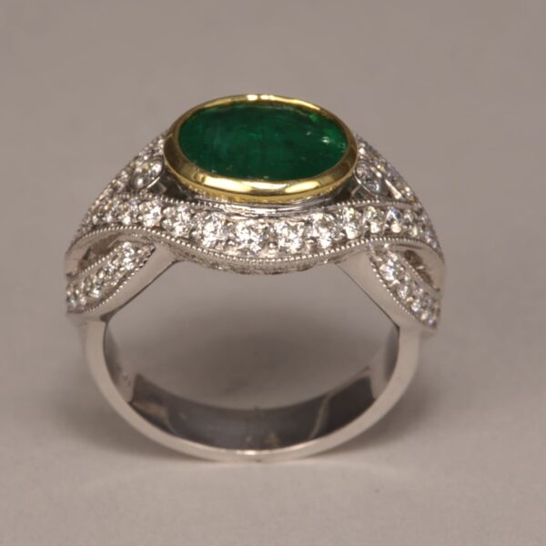 Emerald and diamond ring, stunning two tone gold design