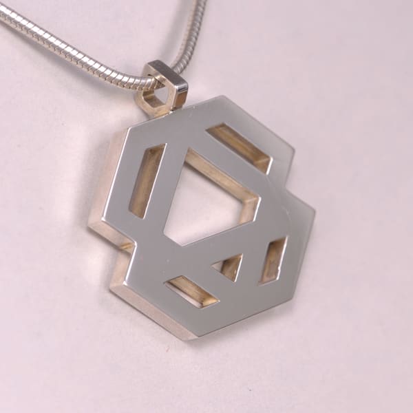 Sterling silver abstract geometric pendant with chain, Casil by Cajuel, unique