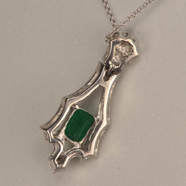 Fine green and diamond pendant inc chain.  Top color, great piece