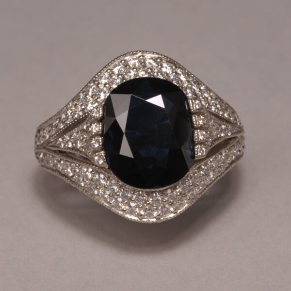 Midnight blue sapphire and diamond ring, fine deep color