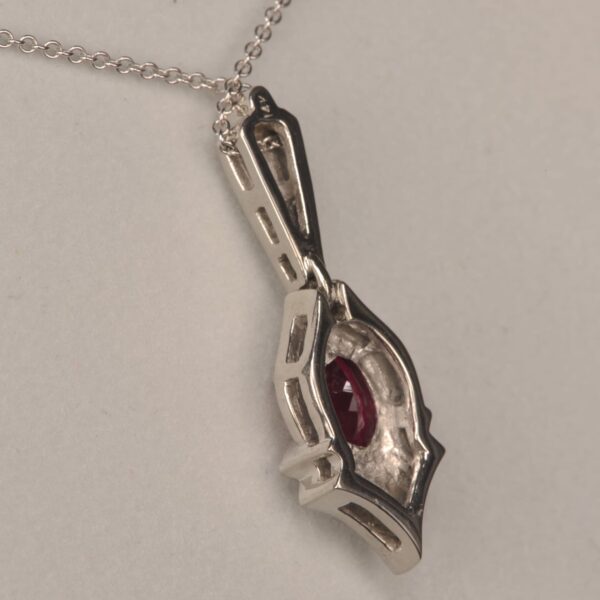 Rubelite (red) tourmaline and diamond pendant, Cajuel deco style