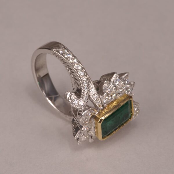 Emerald and diamond ring, two tone gold, roaring 20's design