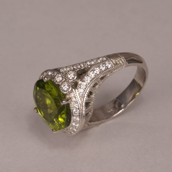 Impressive natural peridot and diamond ring