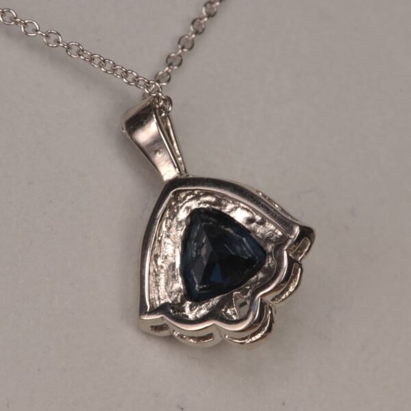 Deep blue sapphire and diamond pendant, deep midnight blue color