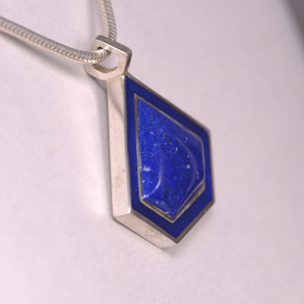 Deep blue lapis and enamel geometric silver pendant