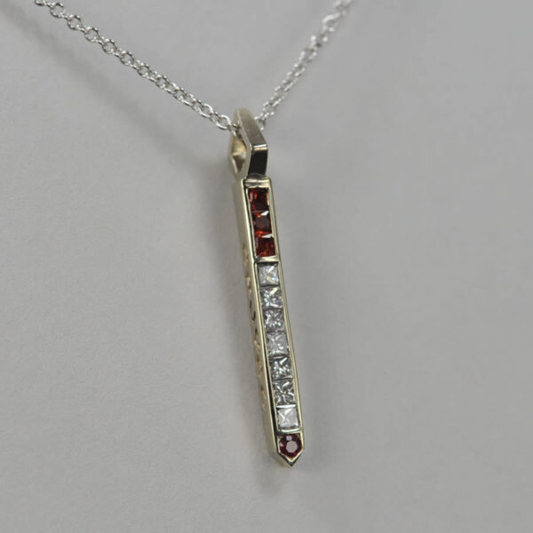 14k diamond and ruby and orange sapphire cigarette pendant with chain